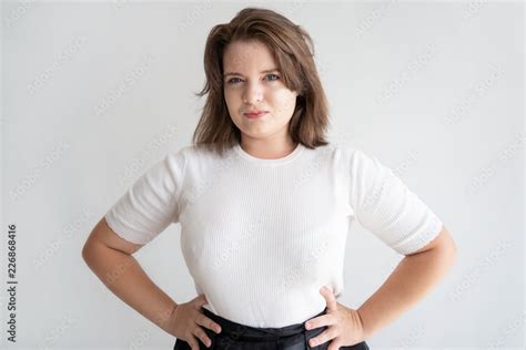 Portrait Of Smiling Chubby Redhead Young Woman Portrait Of。